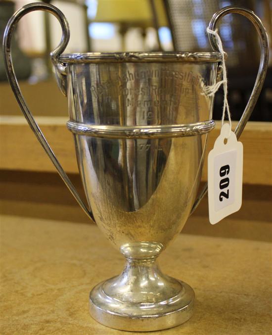 Two handled silver golfing trophy